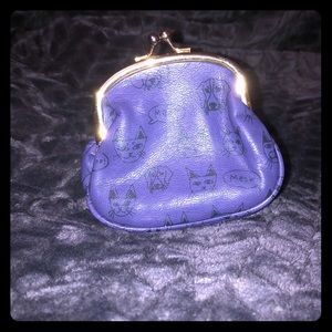 A tiny little purse / wallet